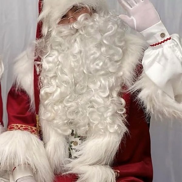 Mascote do Pai Natal em sessão de fotografias